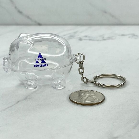 Alcorn Brave Banks Clear Piggy Bank Keychain Keyring - Picture 1 of 7